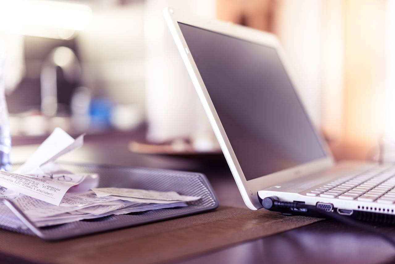 Limited company director reviewing business expenses and receipts for HMRC allowable claims and UK corporation tax rules